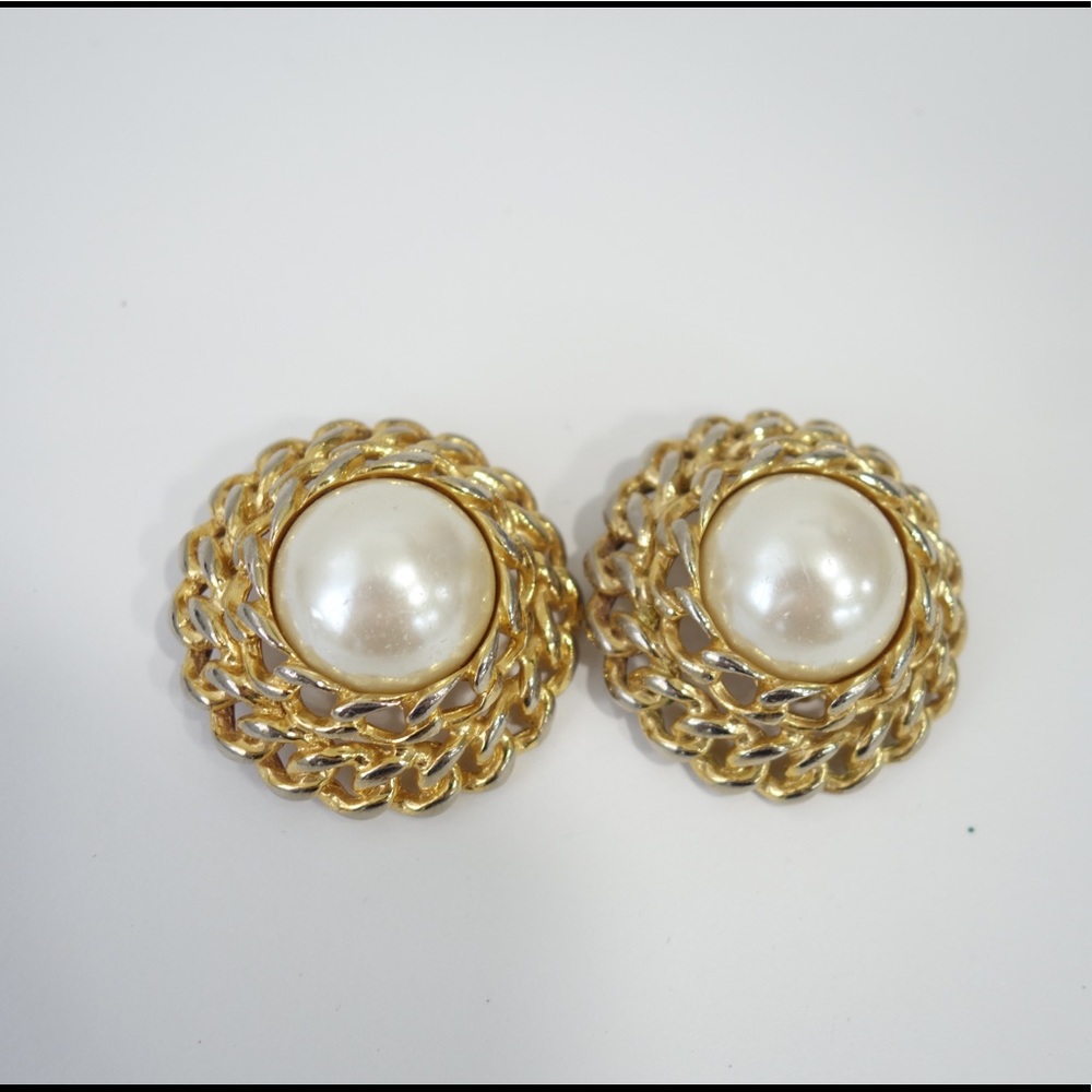 Large gold tone clip on vintage earrings